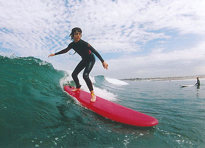Boy surfing down the line at Eli Howard Surf Camp Overnight camps require a ... Boy surfing down the line at Eli Howard Surf Camp Overnight camps require a ...